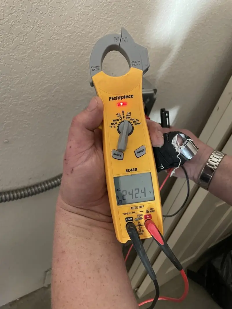 Voltage testing with clamp meter during Hot Tub / Pool Electrical Wiring in Ferguson
